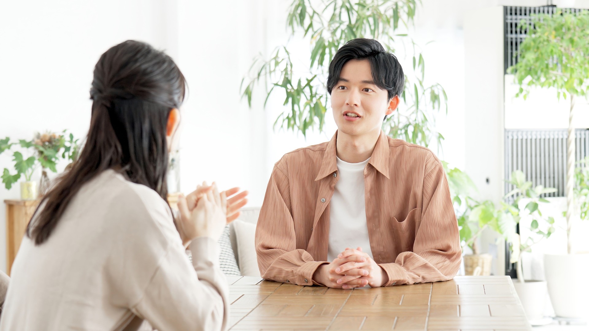 Couple having a serious conversation in the living room